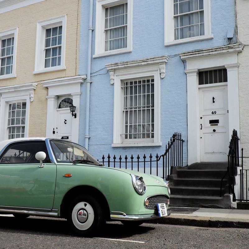 Car outside old town house